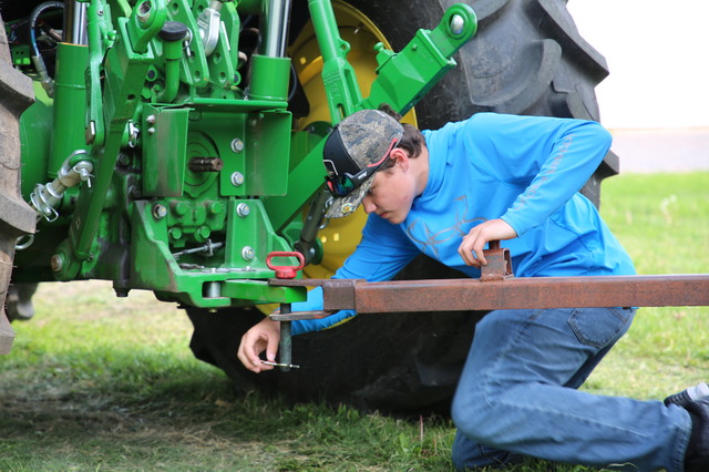 Boy_hitching_implement.jpg